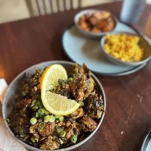 Brussel Sprouts and tofu scramble and potatoes in the background.