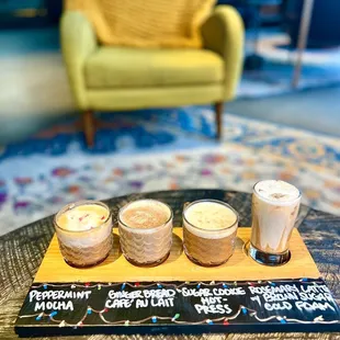 Winter coffee flight  Peppermint Mocha, Gingerbread Cafe' Au Lait, Sugar Cookie Hot Press, Rosemary Latte with brown sugar cold foam
