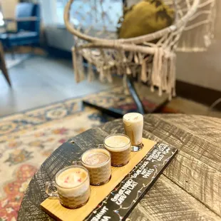 Winter coffee flight  Peppermint Mocha, Gingerbread Cafe' Au Lait, Sugar Cookie Hot Press, Rosemary Latte with brown sugar cold foam