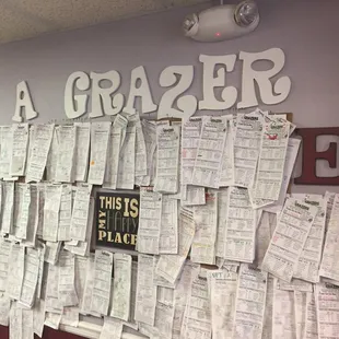 The menu wall. Leave your order sheet on the wall so you don't have to write it out every time!