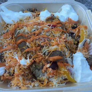 An absolutely LOADED Baked potato with all the best toppings!!  It's enough to share, but you won't want to!!