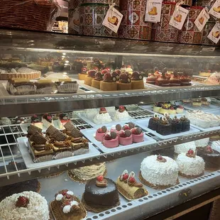 a display of cakes