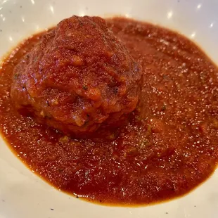 a meatball in a tomato sauce