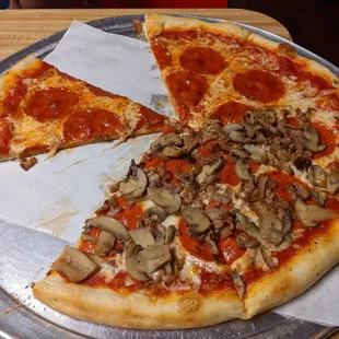 Large with pepperoni. Half with mushrooms and sausage.