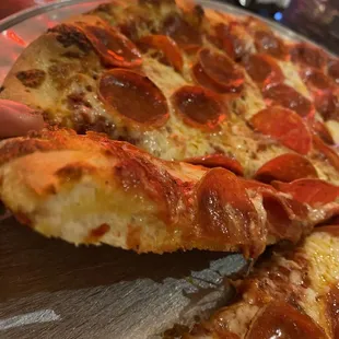 Side view of pizza