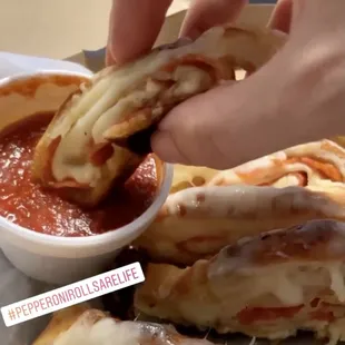 Pepperoni Roll Typically served with both sauce &amp; cheese on top, but I order mine with the sauce on the side.