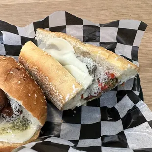 a sandwich with meatballs and cheese