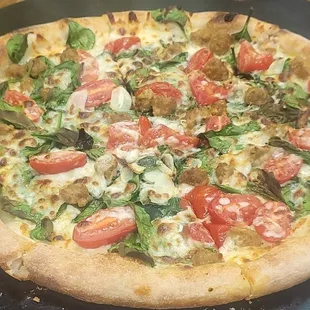 Spinato:  Olive OIl Base, Fresh Garlic, Sausage, Fresh spinach and tomatos