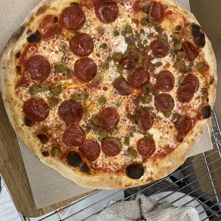 a pepperoni pizza in a box