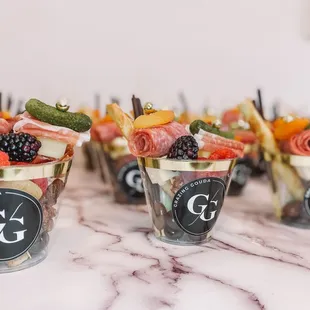 Charcuterie cups perfect for weddings, open houses, and other events. Plus they're COVID friendly!
