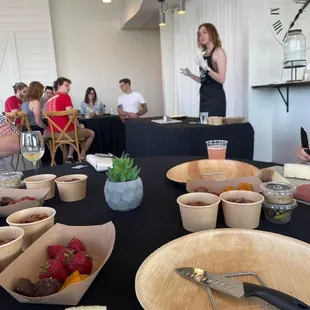 Hosted at the Urban Farmhouse Room. Alcohol was available to purchase. She did a demonstration step by step, and we took our boards home.