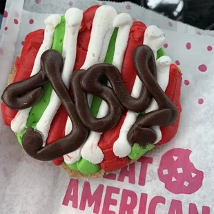 a doughnut with icing and toppings