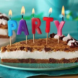 a birthday cake with candles