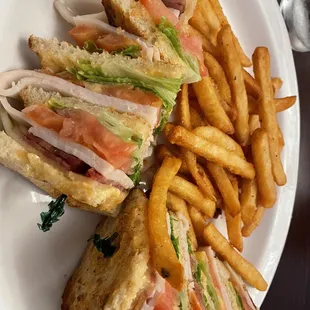 Clubhouse sandwich and crispy fries