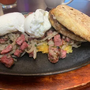 Corned Beef Hash, Hash Browns, Poached Eggs, English muffin, Tomato Juice, Coffee