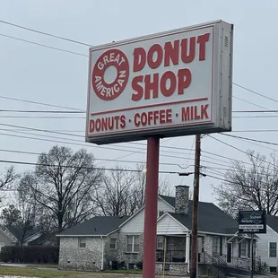 a sign for a donut shop