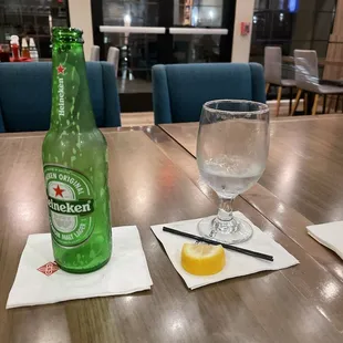 My empty Heineken and water!