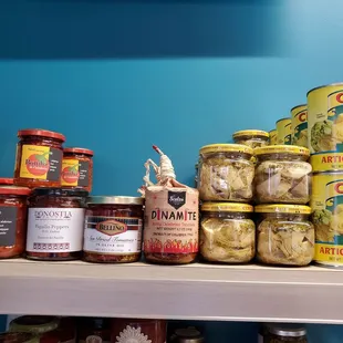 a shelf of canned food