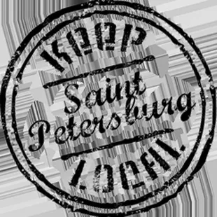 a black and white image of a stamp with the words