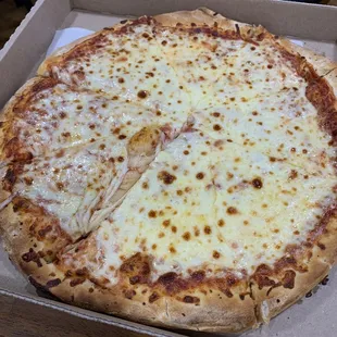 a cheese pizza in a box