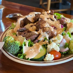 Garden salad with steak