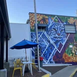 a colorful mural on the side of a building