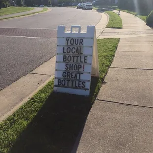 a sign on the side of the road