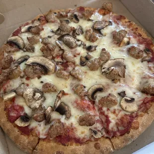 Cauliflower mushroom and sausage pizza