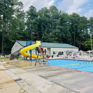 Slide, deck and pool