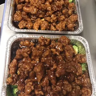 two trays of chicken and broccoli
