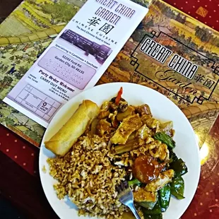 a plate of food and a menu