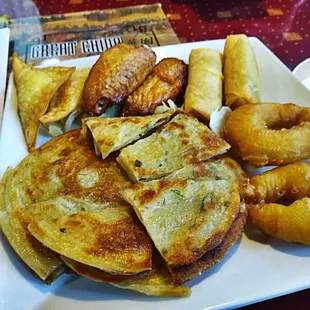 Scallion Pancakes, Jumbo Shrimp, Crab Rangoon, Spring Rolls and Chicken Wings only 10 bucks n change Delicious  Wowed