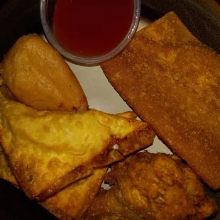 I ate the egg roll before taking picture. We ordered the crab Rangoons extra. Soooo good.