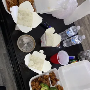 Three containers of rice General Tso&apos;s Chicken and Sesame Chicken