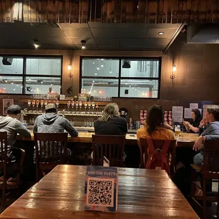 people sitting at the bar