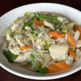 a white bowl filled with vegetables