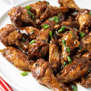 a plate of chicken wings