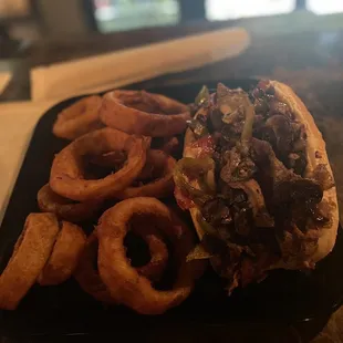 Steak sandwich with onion rings