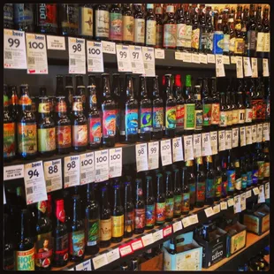 a wide selection of beer bottles