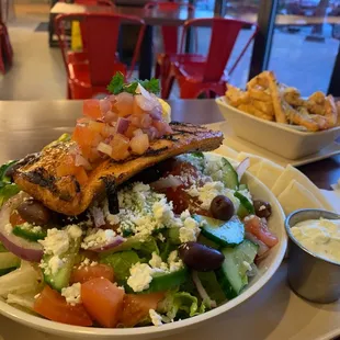 Large Greek salad with fresh tasting charred salmon. Loved it.