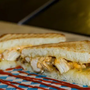 Hot Chick sandwich- grilled chicken breast with pepper jack cheese all grilled on Old Fashioned White topped with spicy mayo.