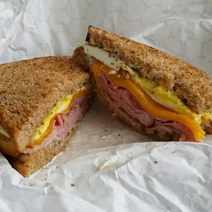 Ham, egg &amp; cheese breakfast sandwich on honey wheat.