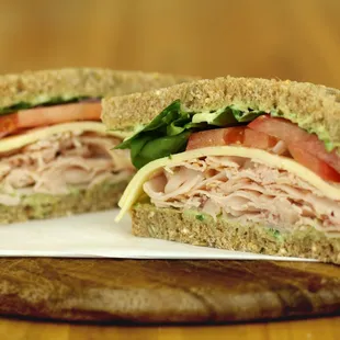 Greenway- Roasted Turkey Breast, lettuce, tomatoes, red onions, provolone cheese with a pesto mayo.