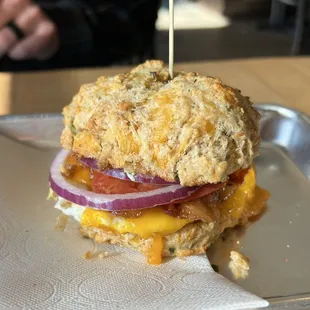 Breakfast sandwich on a cheddar jalapeño biscuit, add bacon and avocado *chefs kiss*