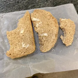 Day old bread sample, the heel slice with trace amount of butter.