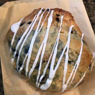HUGE- delicious blueberry lemon scone with icing. It was so big my daughter could only eat half, smell was heavenly! Free with my coupon.