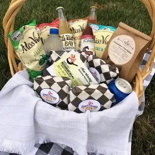 a picnic basket full of snacks
