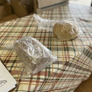 two loaves wrapped in plastic