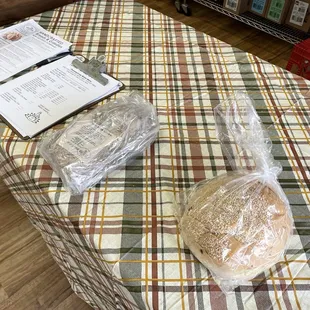 a loaf of bread wrapped in plastic