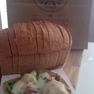 a sandwich with cheese and lettuce